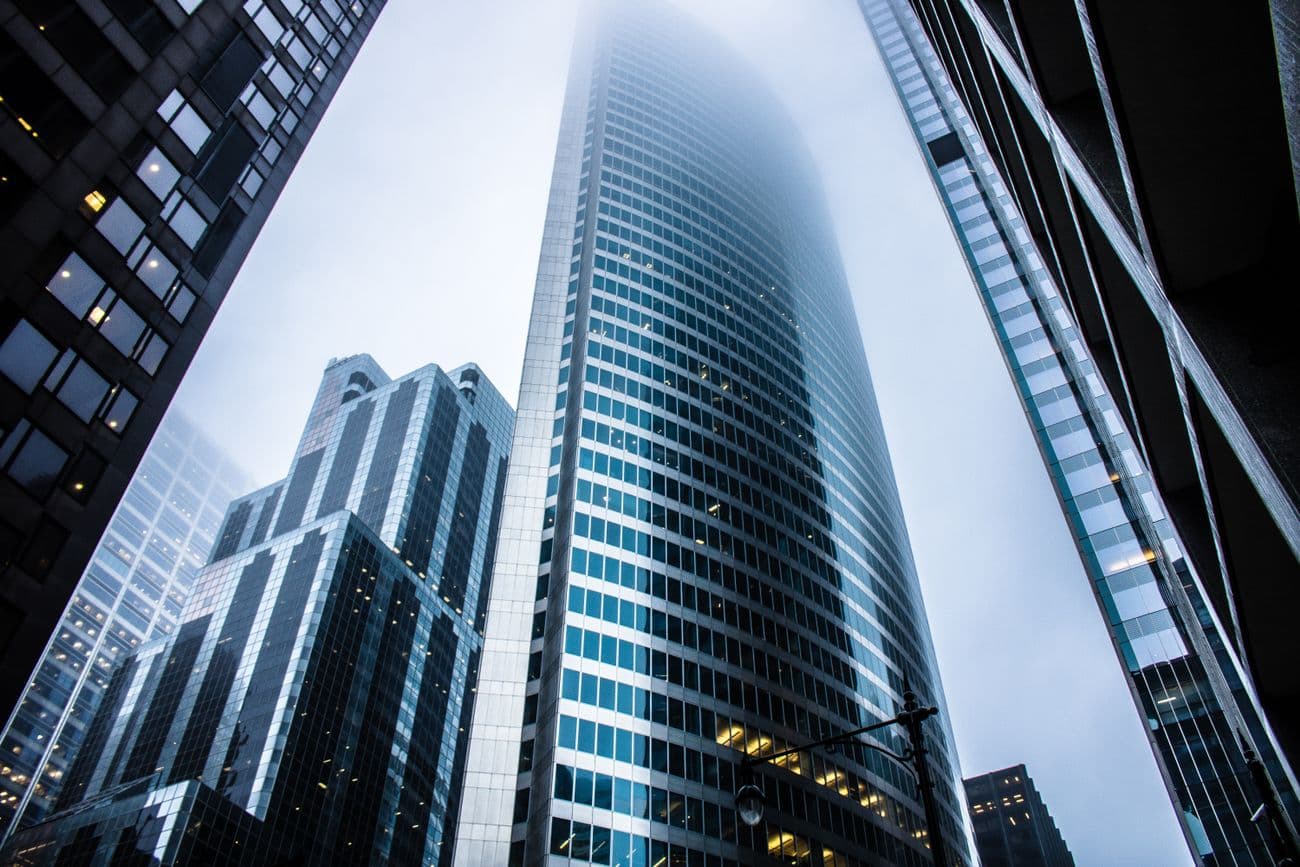 Looking up at rising glass towers