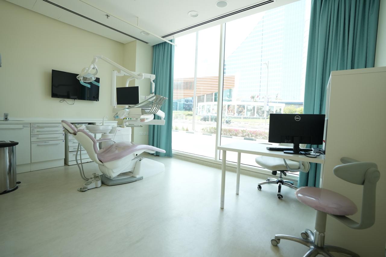 Dental treatment room with dental chair in a licensed Dubai clinic