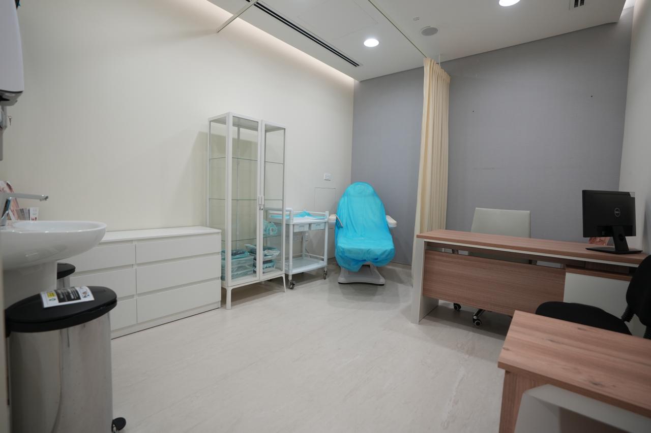 Treatment room with procedure chair and instrument cabinet in a licensed Dubai clinic