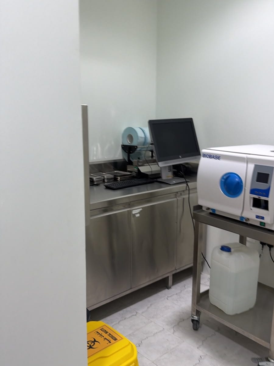 Sterilisation room with autoclave and instrument bench in a day surgery centre in Jumeirah, Dubai