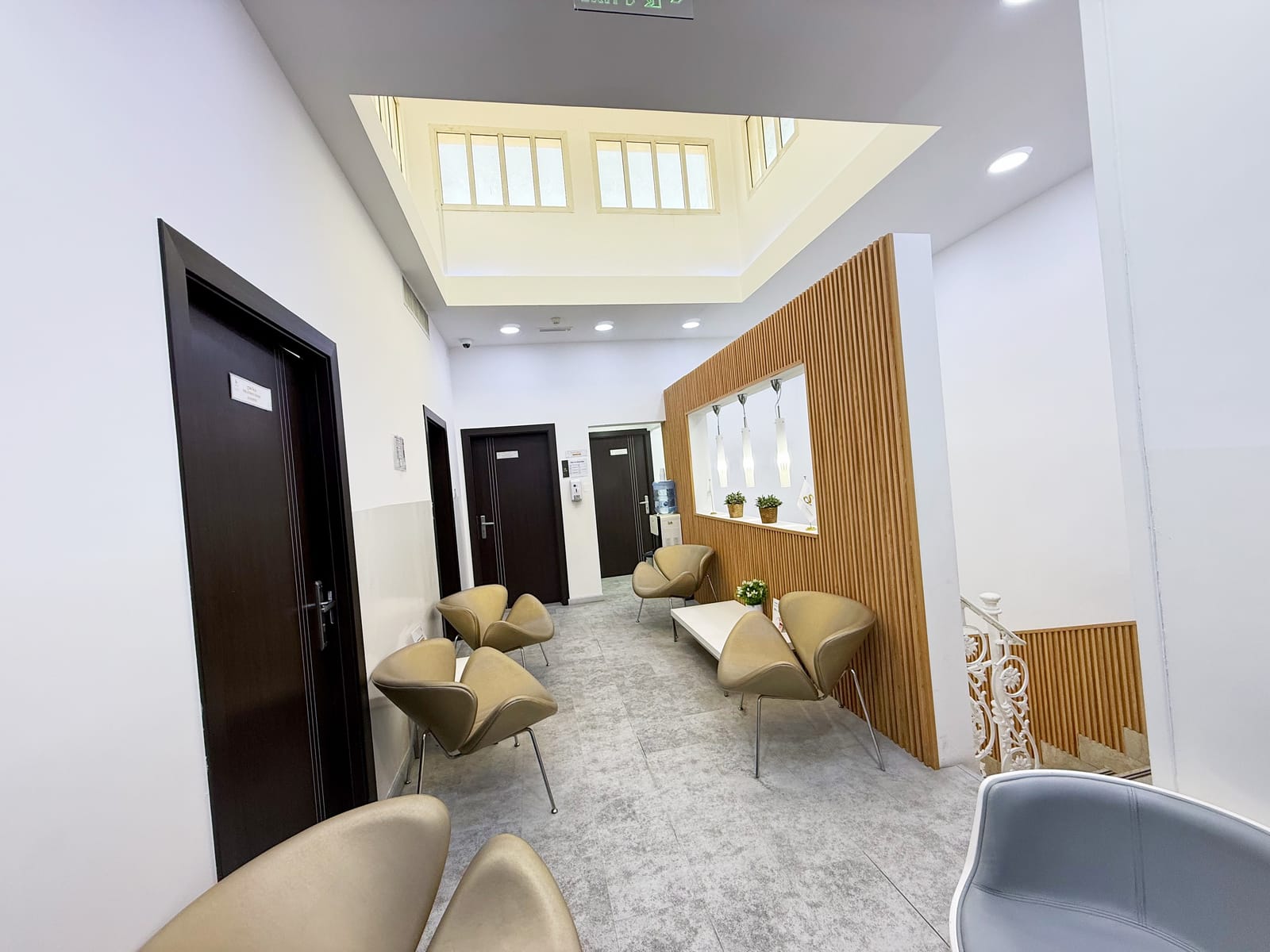 Waiting seating along the clinical corridor in a poly clinic in Jumeirah, Dubai